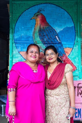 Teachers Vijaya Mishru (left) and Rekha Bhusal confirm that the bamboo schools are pleasant teaching environments.