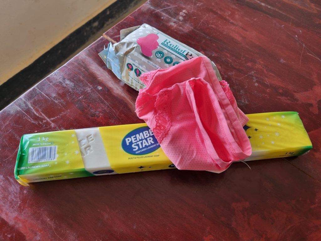 Underwear, soap and some wipes on a table